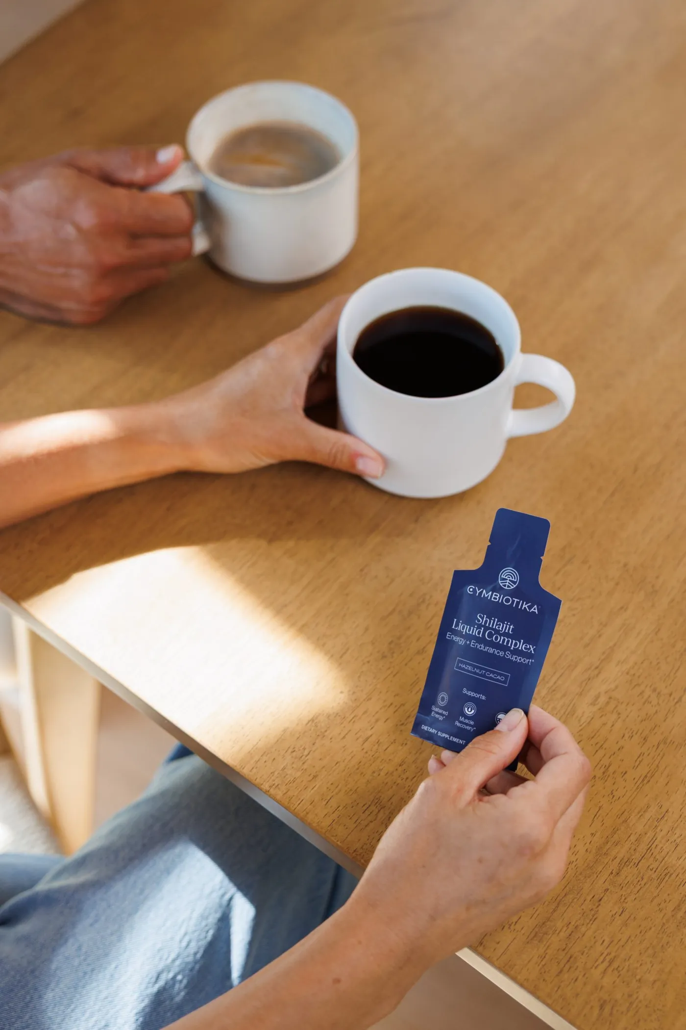 Shilajit packet at the table with coffee